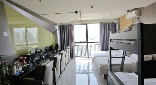 Кровать в общем номере Mu Ye Esports Hotel