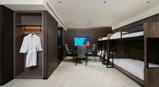 Кровать в общем номере i Electronic Sports Hotel (Zhengzhou CBD Exhibition Center Shilipu Subway Station)