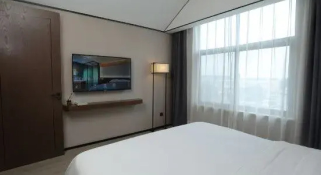 Люкс Executive с 2 комнатами Moshang Qingju Hotel (Xihua Nuwa Plaza Branch)