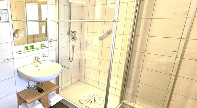 Четырёхместный номер Comfort с балконом и с видом на горы Hotel Fuggerhof Oberstdorf
