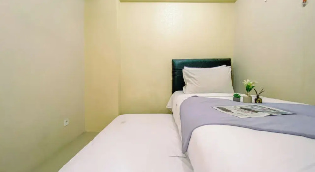 Апартаменты Deluxe 2BR with Cozy Style at Bassura City Apartment By Travelio