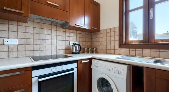 Апартаменты Charming 2 bedroom apartment 'DC11' - with communal pool and resort facilities, Helios Heights village on Aphrodite Hills Resort
