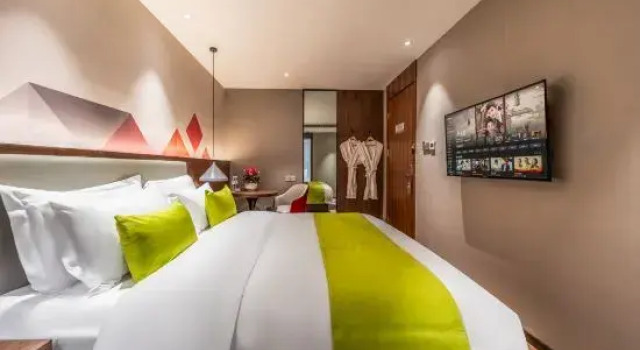 Семейный люкс Qujing Ouduo Hotel (Qilin District South City Store)