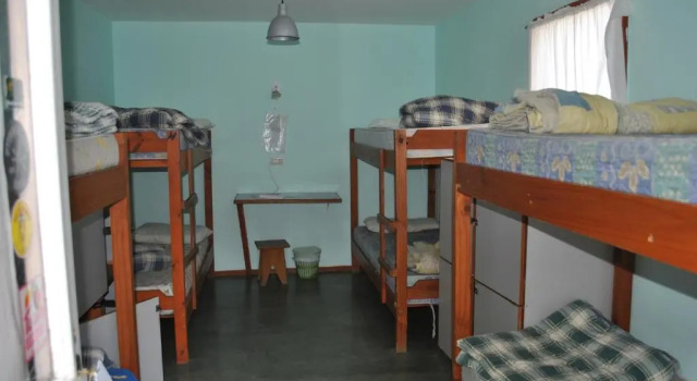 Кровать в общем номере Hostel Los Cormoranes