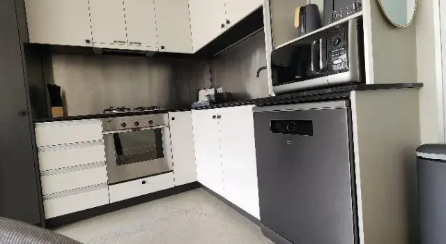 Номер Deluxe Absolute Collins Apartments