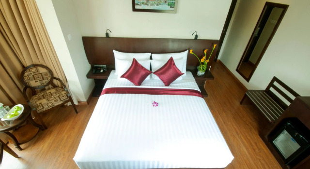 Номер Deluxe M Village Hotel Tao Đàn Park, a brand of Modern Village Lifestyle