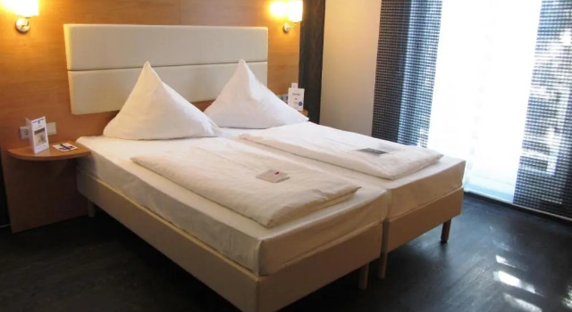 Двухместный номер Standard PLAZA INN Stuttgart-Ditzingen