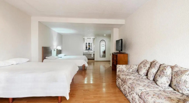 Standardowy trzyosobowy pokój San Marino Suites