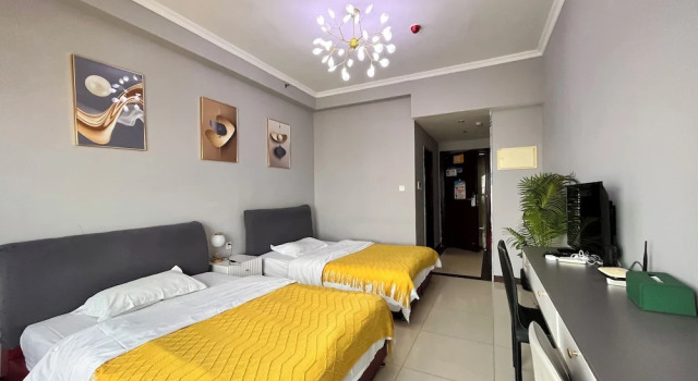 Номер Economy Yi Long International Apartment