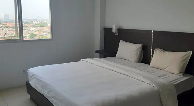 Люкс OYO Flagship 90087 Apartment Menara Rungkut 2