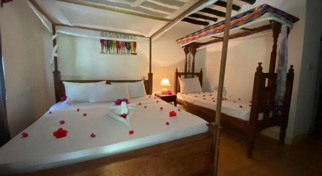 Трёхместный семейный номер Standard с 4 комнатами Menai Bay Beach Bungalows