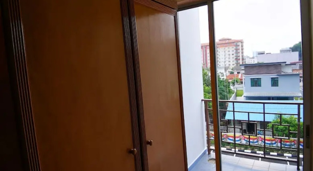 Трёхместный номер Deluxe с балконом Heng Ann Guest House