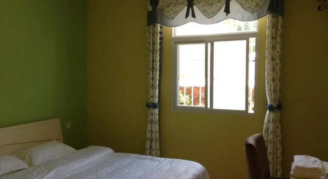 Flower Blooming Inn, Book Hotel Xichang Sichuan