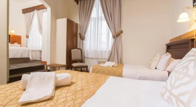 Четырёхместный номер Standard Hotel Plaza