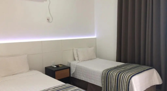 Четырёхместный номер Standard Fenix Hotel Pouso Alegre