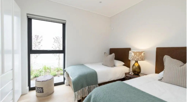 Sunset Villa - brand new home 200m from the beach - top floor only