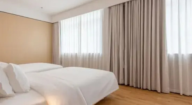 Люкс Deluxe Yueshang Hotel (Guangzhou Olympic Sports Center Shenzhou Road Subway Station Branch)