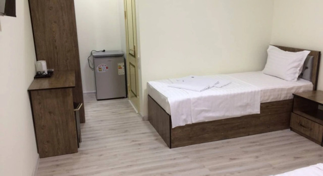 Standard quarto Usmon Khuja