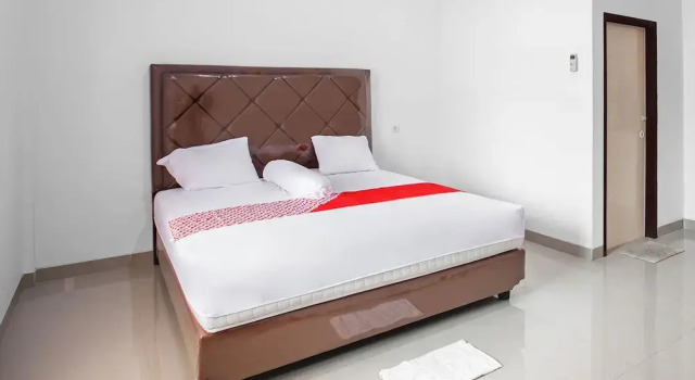 Номер Deluxe Hotel O Homestay Romauli Kampung Radja