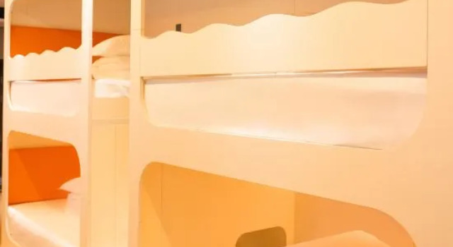 Кровать в общем номере Yueta H Esports Hotel (Wuxiang Shimao Center Branch)