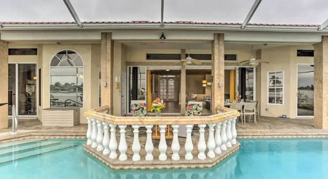 Коттедж с 3 комнатами с балконом Lakefront Cape Coral Home w/ Private Pool & Dock!