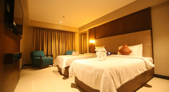Номер Deluxe Yash International Calicut