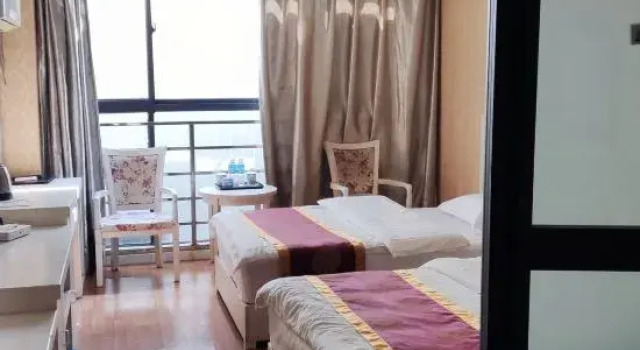 Кровать в общем номере Yunxian Wanhao Hotel