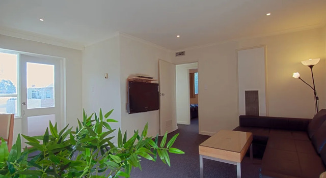 Апартаменты Executive Park Squire Motor Inn & Serviced Apartments