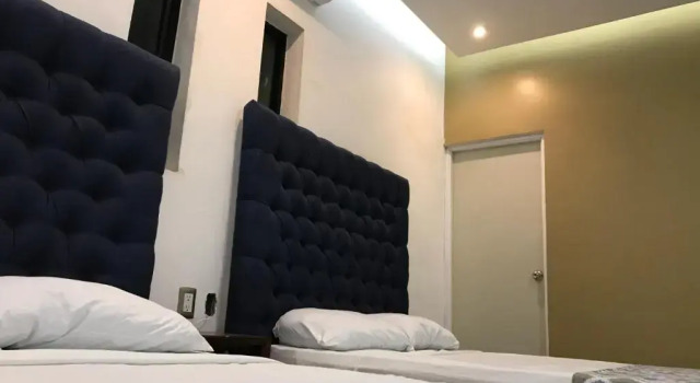 Четырёхместный номер Comfort Hotel Plaza Amalia