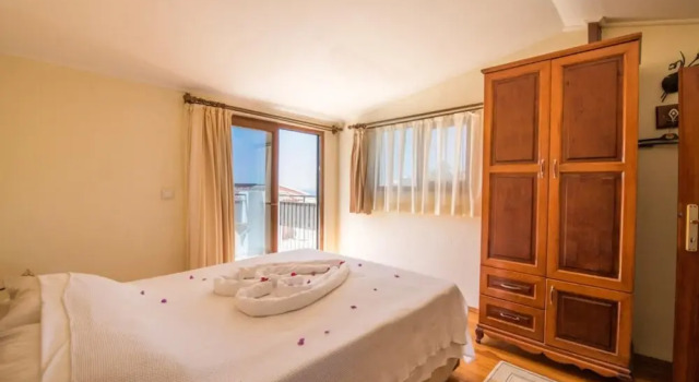 Amazing Flat With Shared Pool and Balcony in Kas, Забронировать Апартаменты/квартира Анталья провинция Анталья