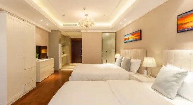 Кровать в общем номере Xilaide Seaview Apartment Hotel
