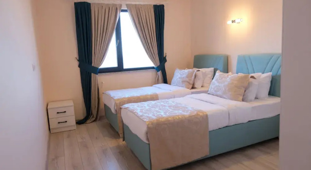 Апартаменты с 3 комнатами с балконом и с видом на море Şahin Tepesi Apart Otel