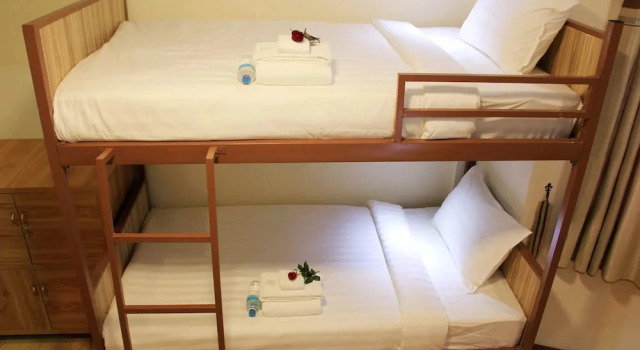 Łóżko w pokoju wieloosobowym (pokoju wieloosobowym dla mężczyzn) Hotel Royal Rose