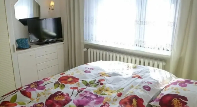 Коттедж с балконом Ferienhaus Dünengras - Strand 300m - freistehend