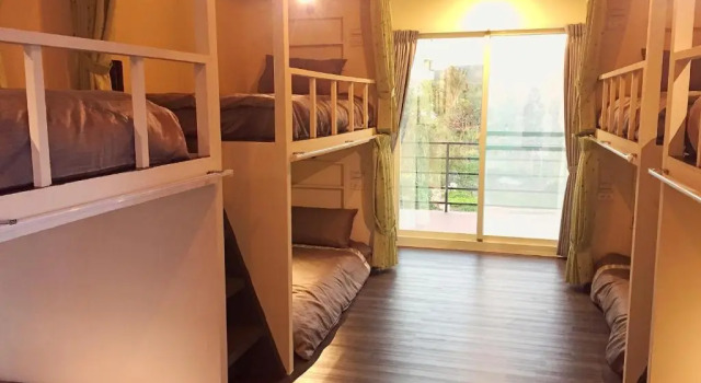 Кровать в общем номере MoMo B&B