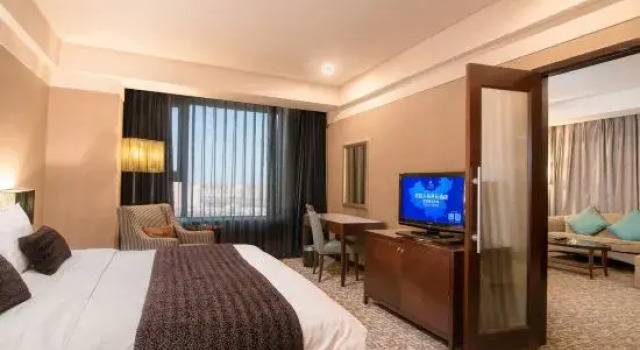 Номер Deluxe GRAND NEW CENTURY HOTEL Binhai Tianjin