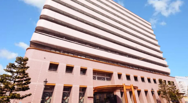 Кровать в общем номере U-Community Hotel