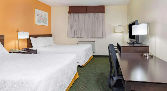 Четырёхместный номер Standard Travelodge by Wyndham Bracebridge