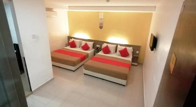 Четырёхместный номер Deluxe Yellow Mansion Hotel Melaka Raya