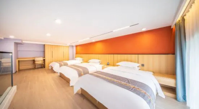 Семейный люкс с 3 комнатами Xitianwu Hotel