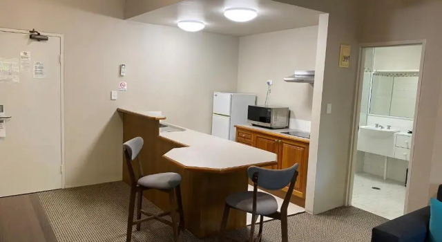 Апартаменты The Belmore Apartments Hotel