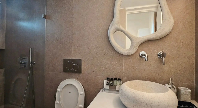Кровать в общем номере Aphrodite Boutique Hotel