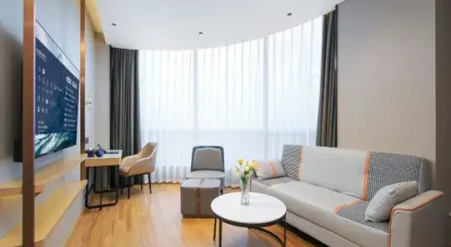 Люкс Deluxe Magnotel Hotel (Gushi Xinhe Shijicheng)