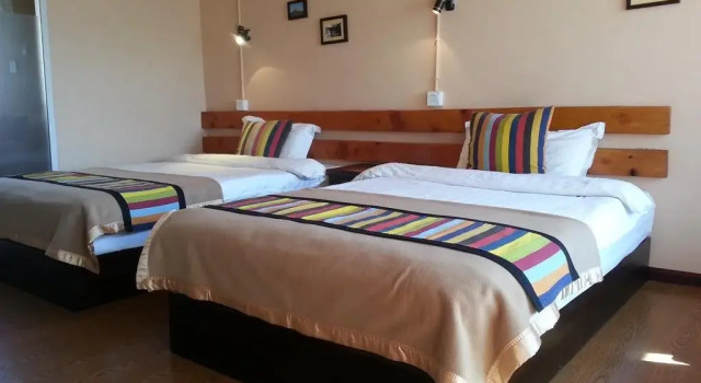 Kevin's Trekker Inn, Buchen Sie Hotel Hotels in Yunnan mit Parkplatz, Parkplätze