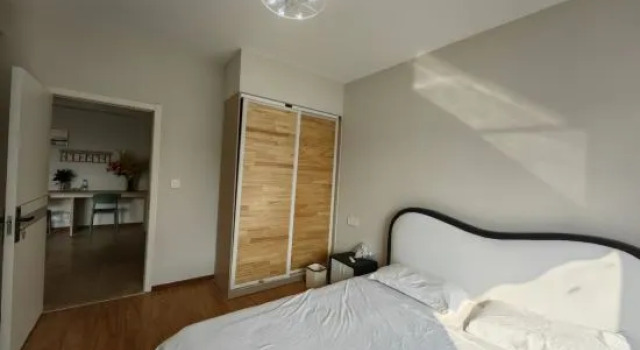 Кровать в общем номере с 2 комнатами Xuanxuanli Homestay (Yichang Duhui Junbo Branch)