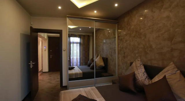 Апартаменты Brown Cottage Apartment
