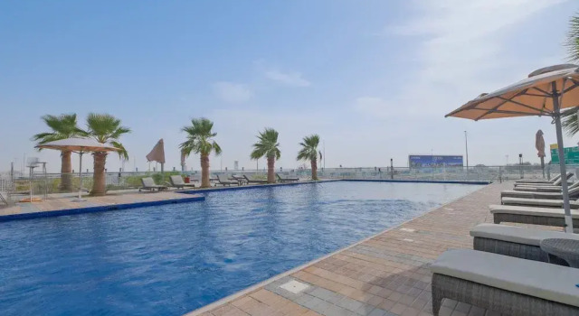 Tranquil 1BR Hideaway in Damac Hills, Забронировать Апартаменты/квартира Дубай Эмират Дубай, рядом с Поле для гольфа Jumeirah Golf Estates