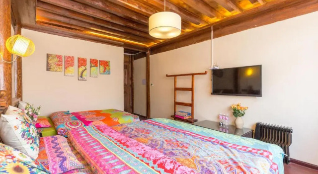 Lijiang Lian Yu Mountain Inn, Забронировать Отель Отели Лицзян с парковкой, рядом с Улица Сквер-стрит Древнего города Даянь, Парковка