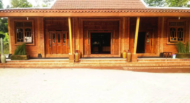 Кровать в общем номере Wanajaya Homestay by ABM