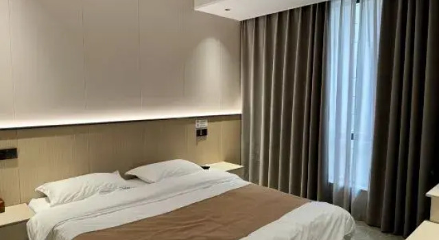 Люкс Deluxe Xinshi Town Tianxinju Inn